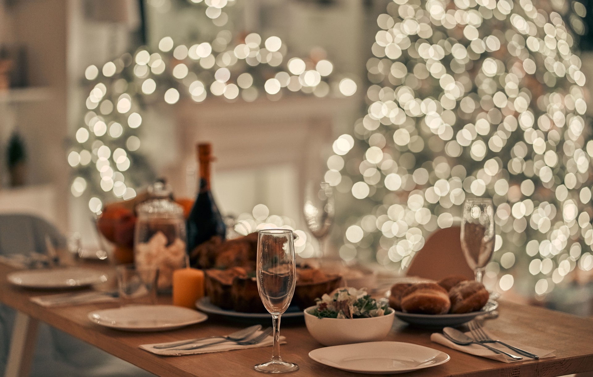 The festive table on the christmas tree background